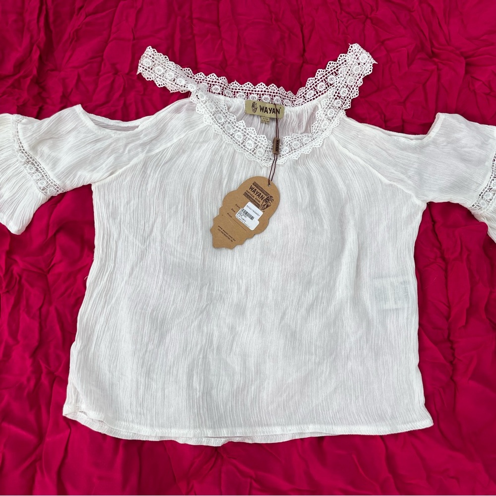 Beautiful eggshell summer top. Cold shoulder. New with tags. 100% rayon.
